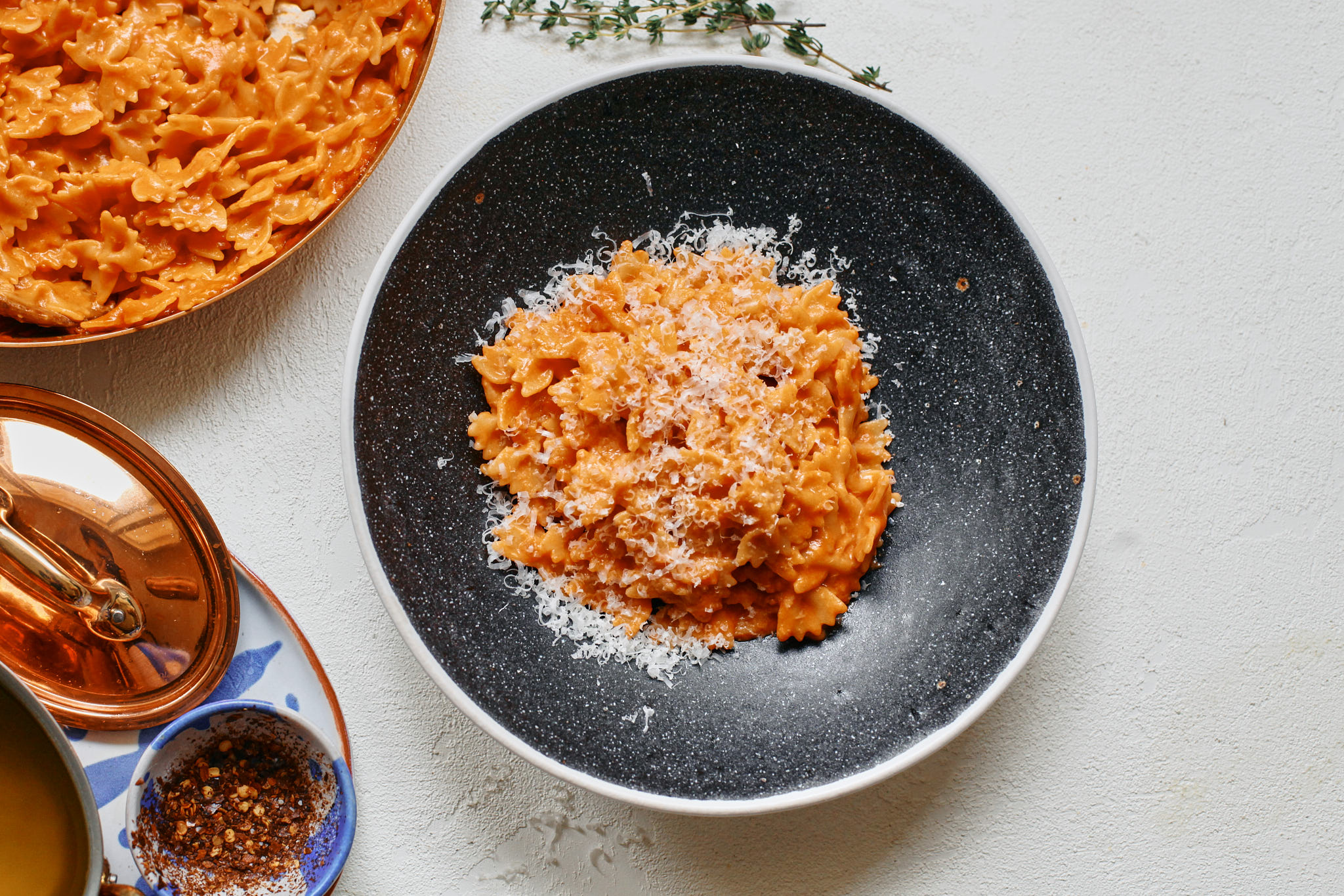 garlic confit pasta alla vodka plated up with parmesan on top