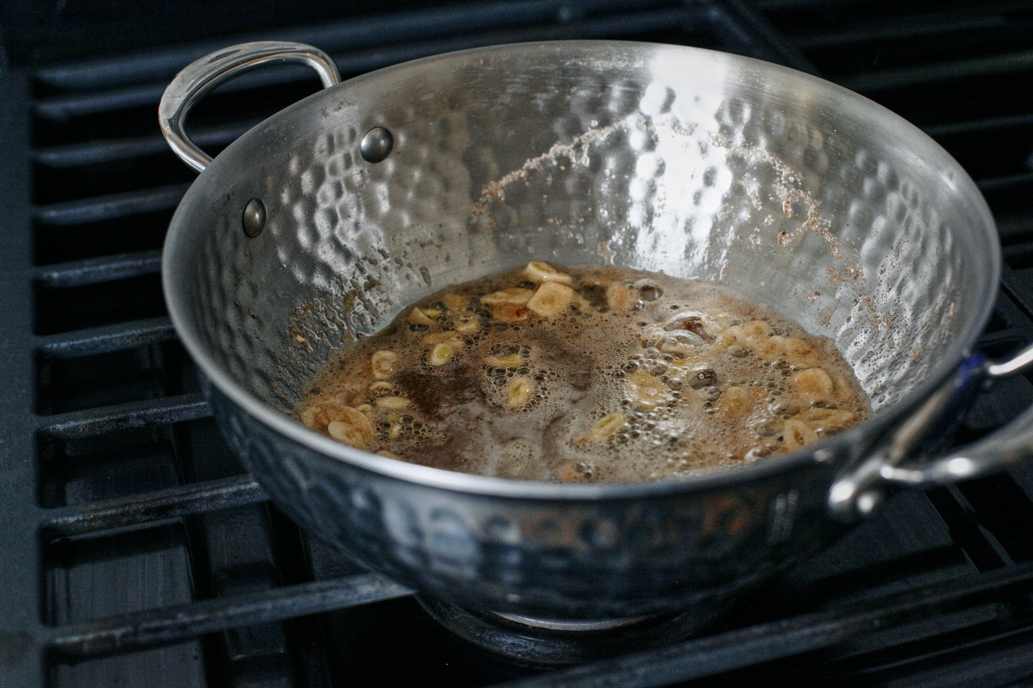 sliced garlic browning in butter