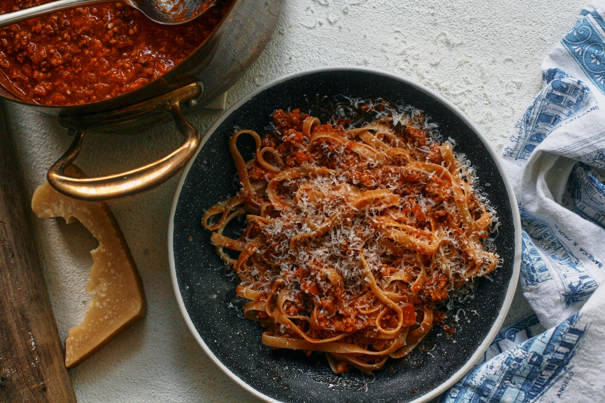 Ragu fettuccine bolognese with parmesan on top