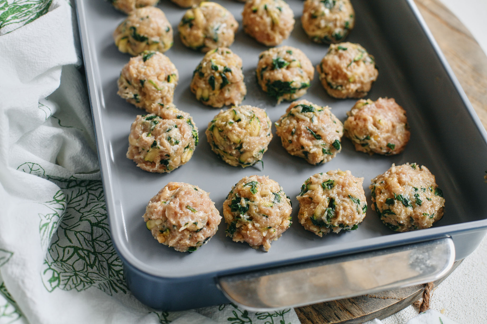 Lemon chicken florentine meatballs with couscous 6 raw chicken meatballs that are formed and ready to bake