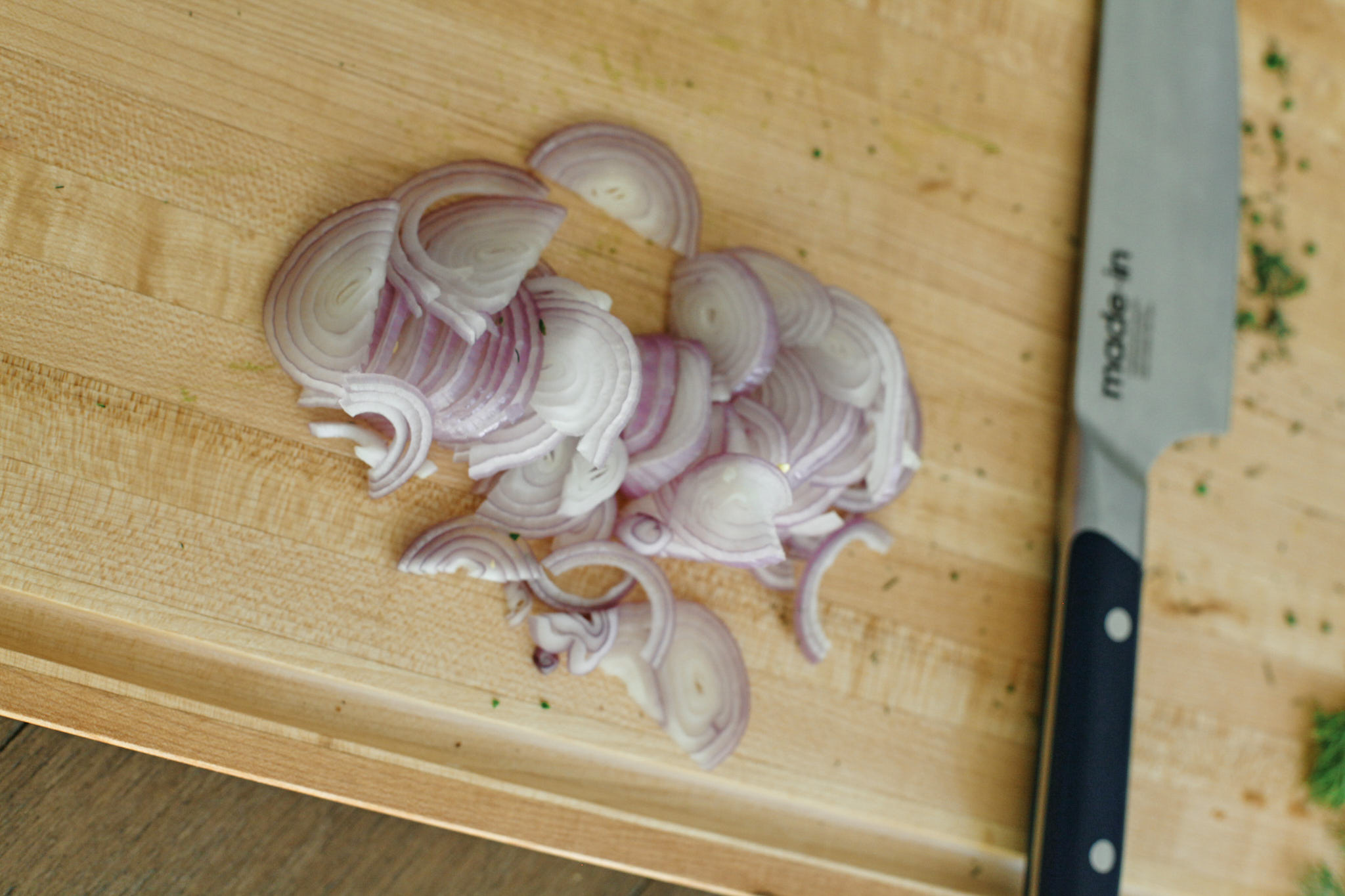 Nordic Jacket Potato 3 sliced shallots ready to fry