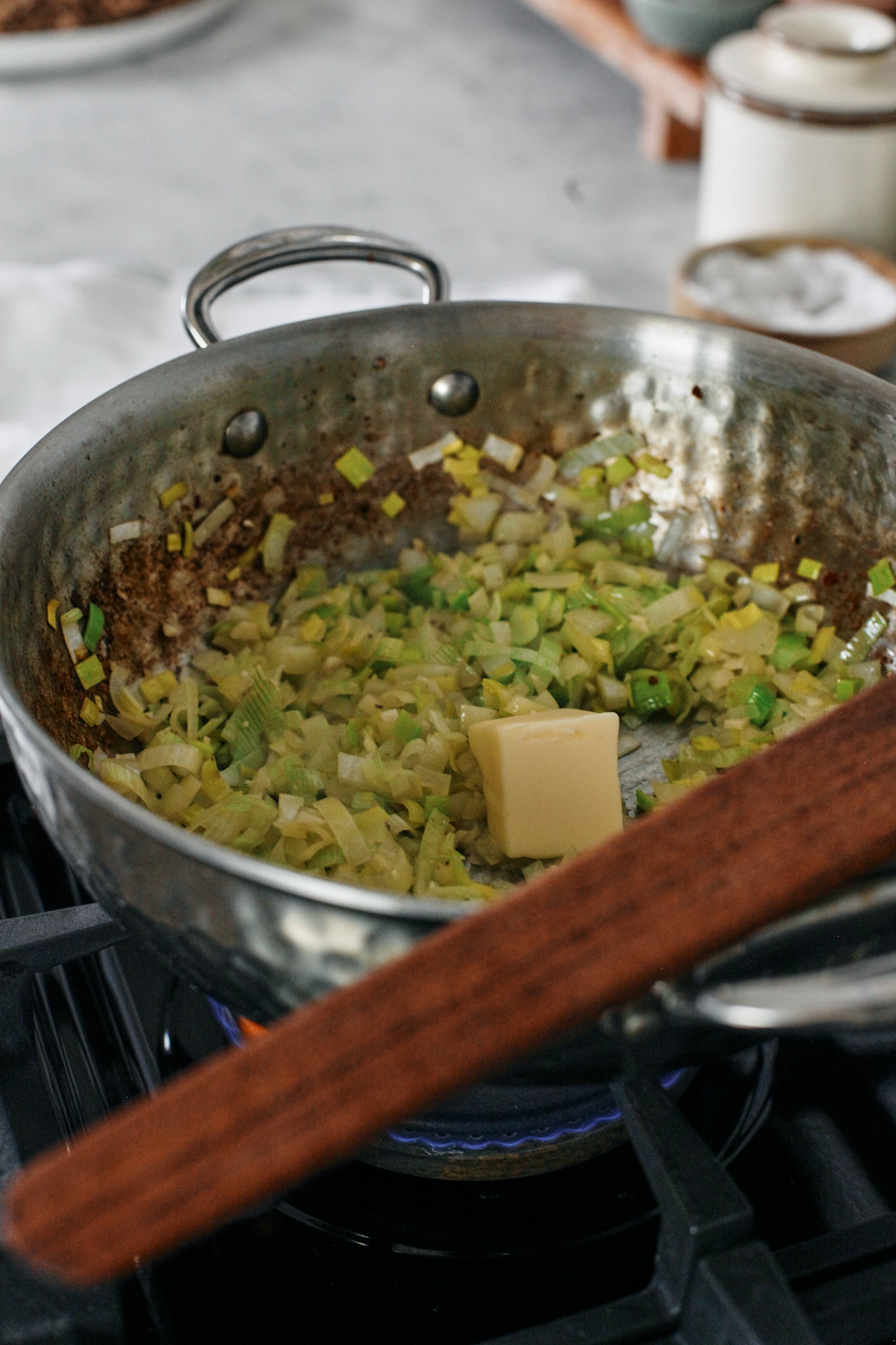 Creamy Tuscan Tortellini Bake 4 leeks, onion and garlic sautéeing in butter