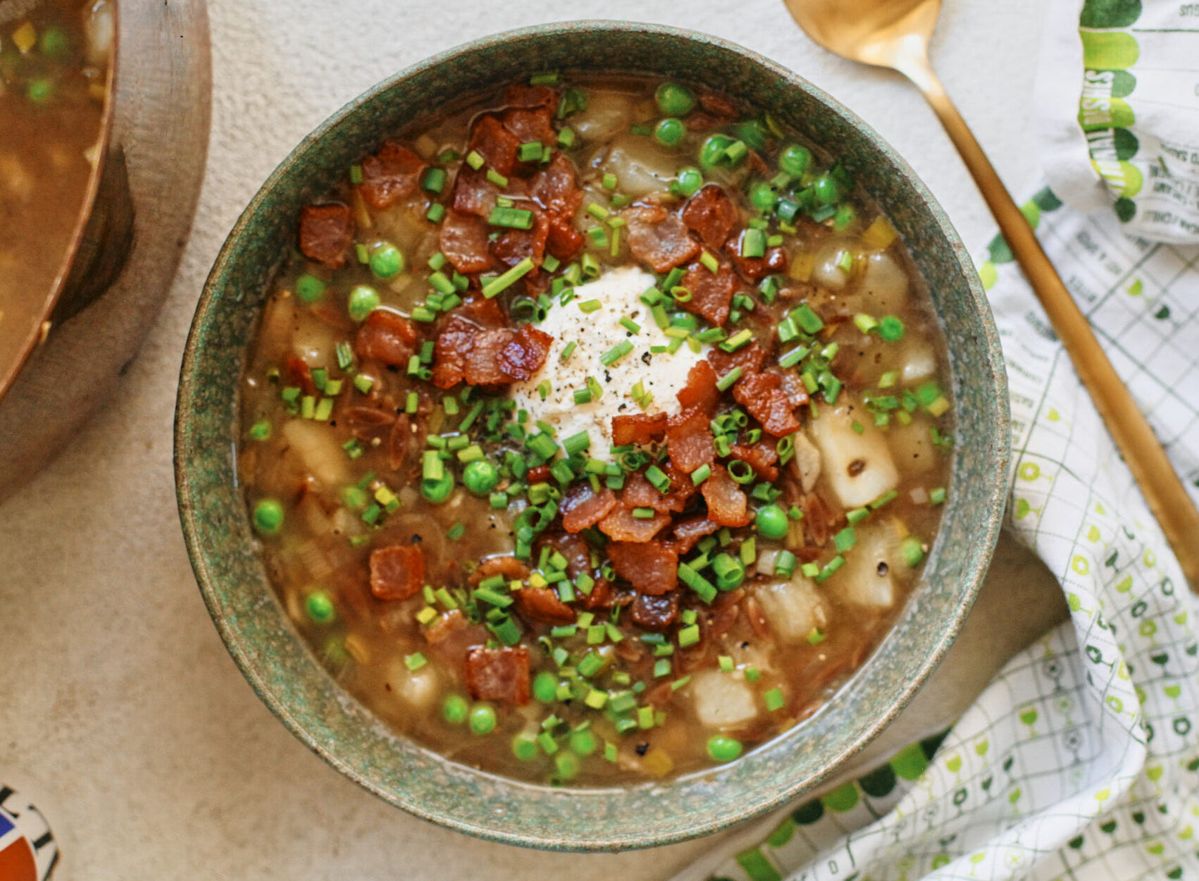 toasted orzo potato leek soup with peas, bacon, chives and creme fraiche