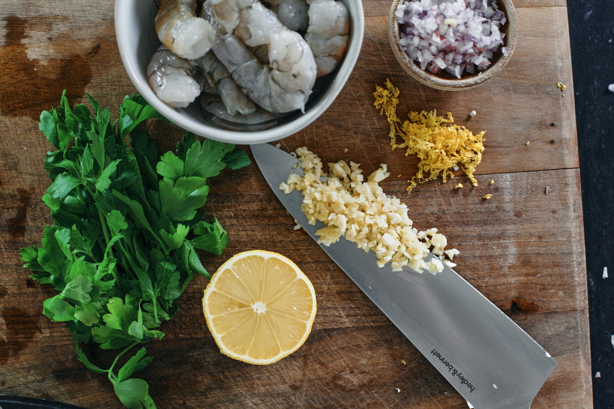 Creamy Lemon Shrimp Bucatini prep for the creamy lemon pasta with shrimp: cleaned deveined shrimp, 1 shallot minced, 2 cloves garlic minced, zest of a lemon, juice of 1/2 lemon, italian parsley.