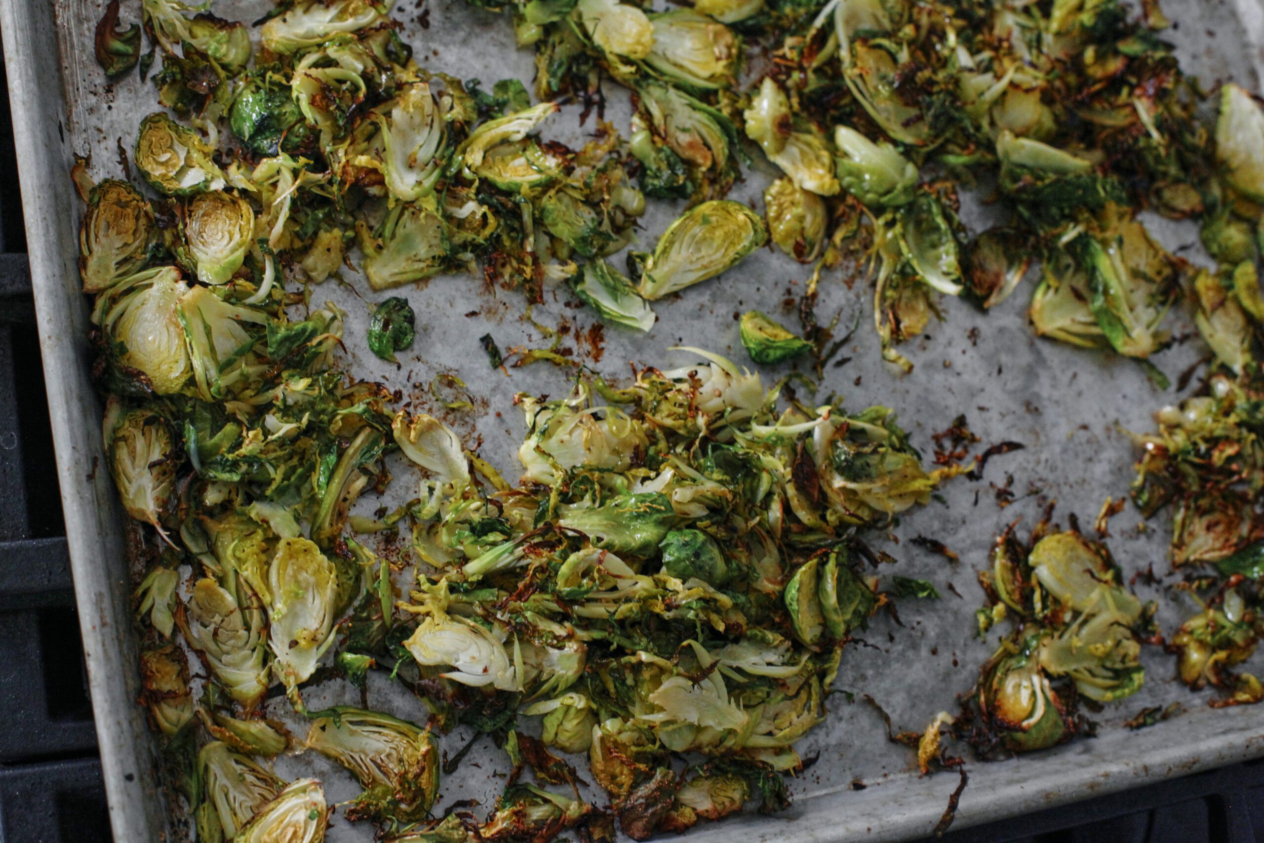 Brussels sprouts on a pan after roasting in the oven