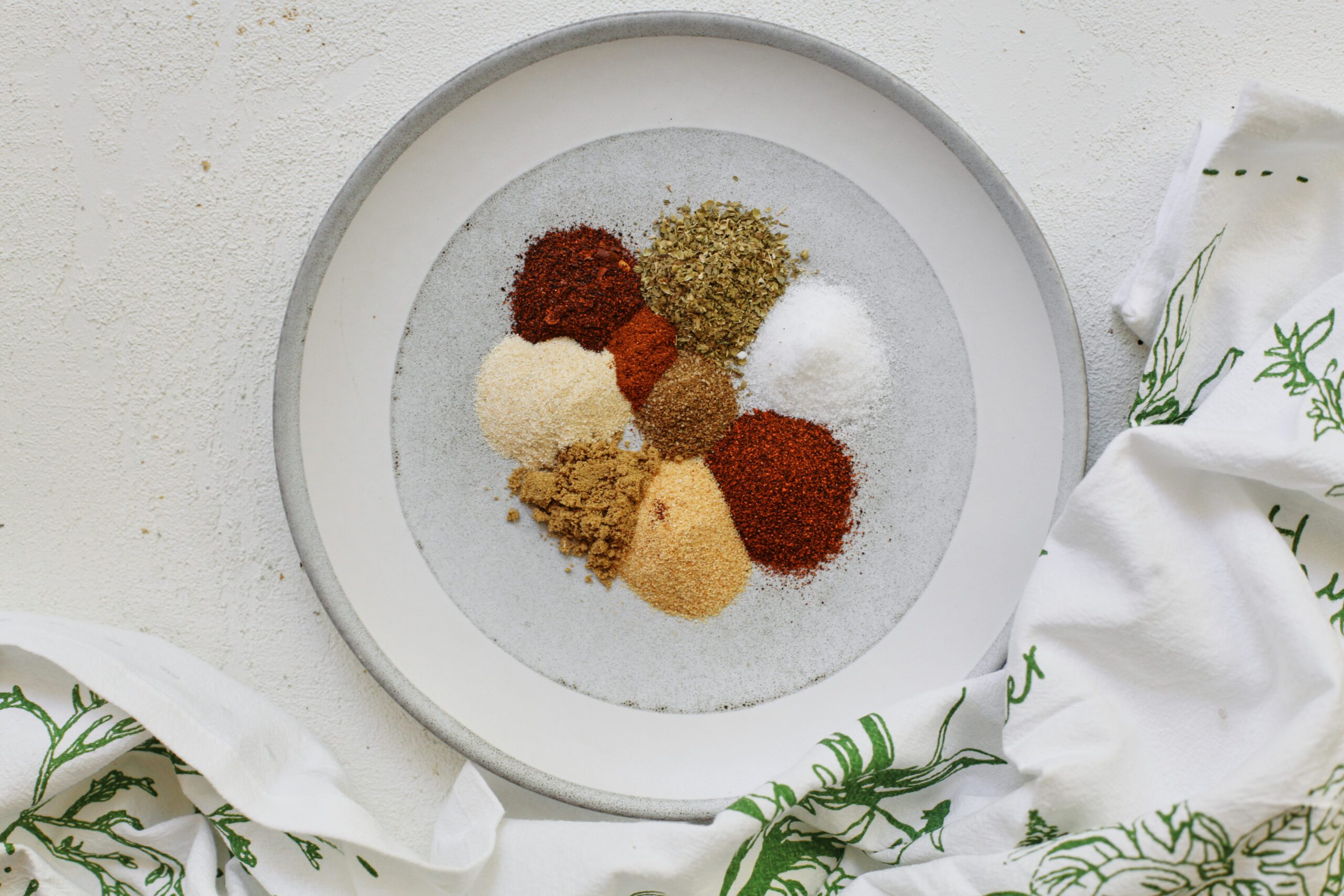 spices in a bowl for sheet pan beef tacos