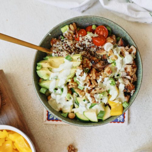 high protein grain bowl with garlic herb yogurt sauce