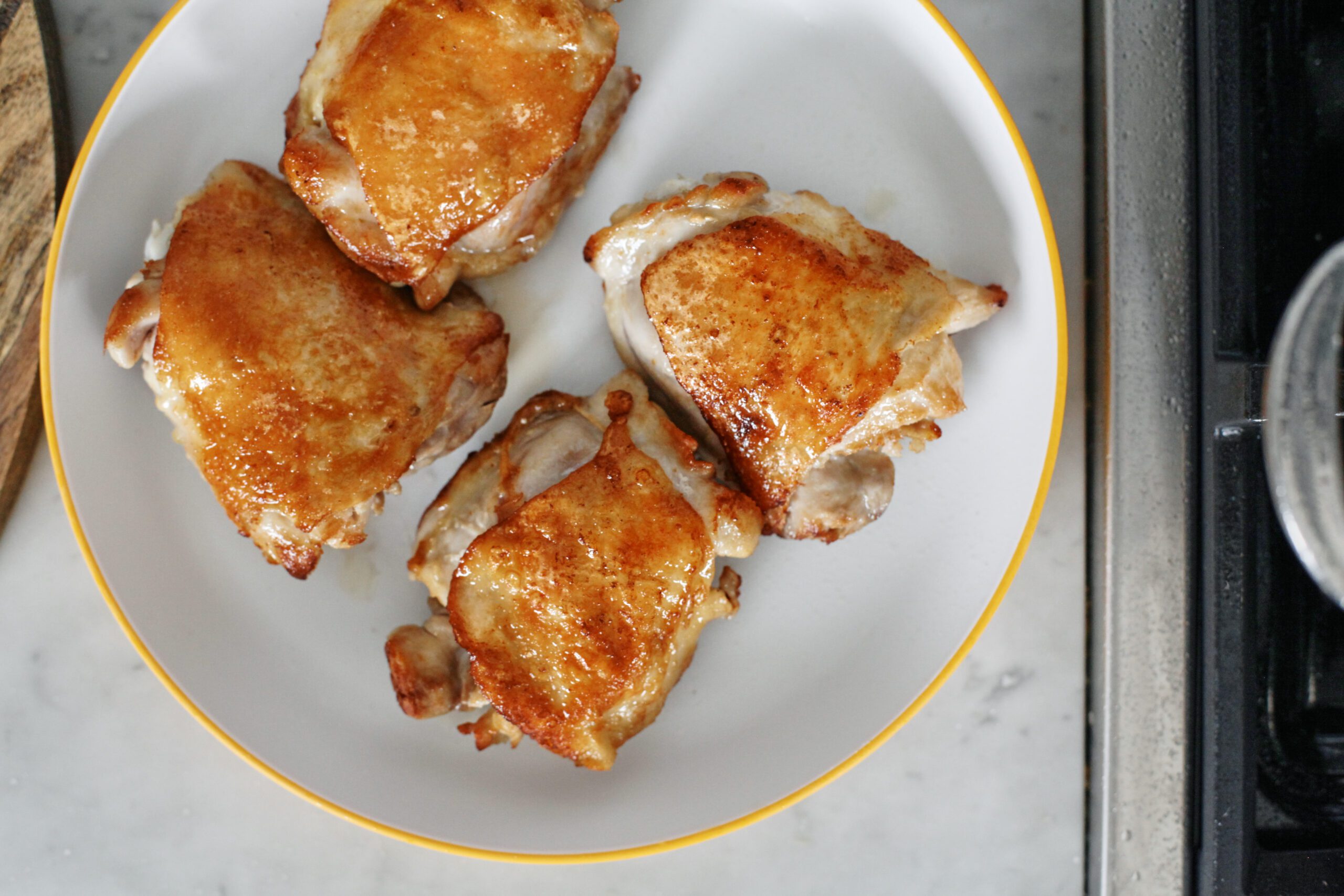 perfectly golden seared chicken thighs
