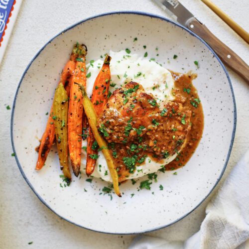 garlic herb chicken with honey butter carrots and mashed potatoes
