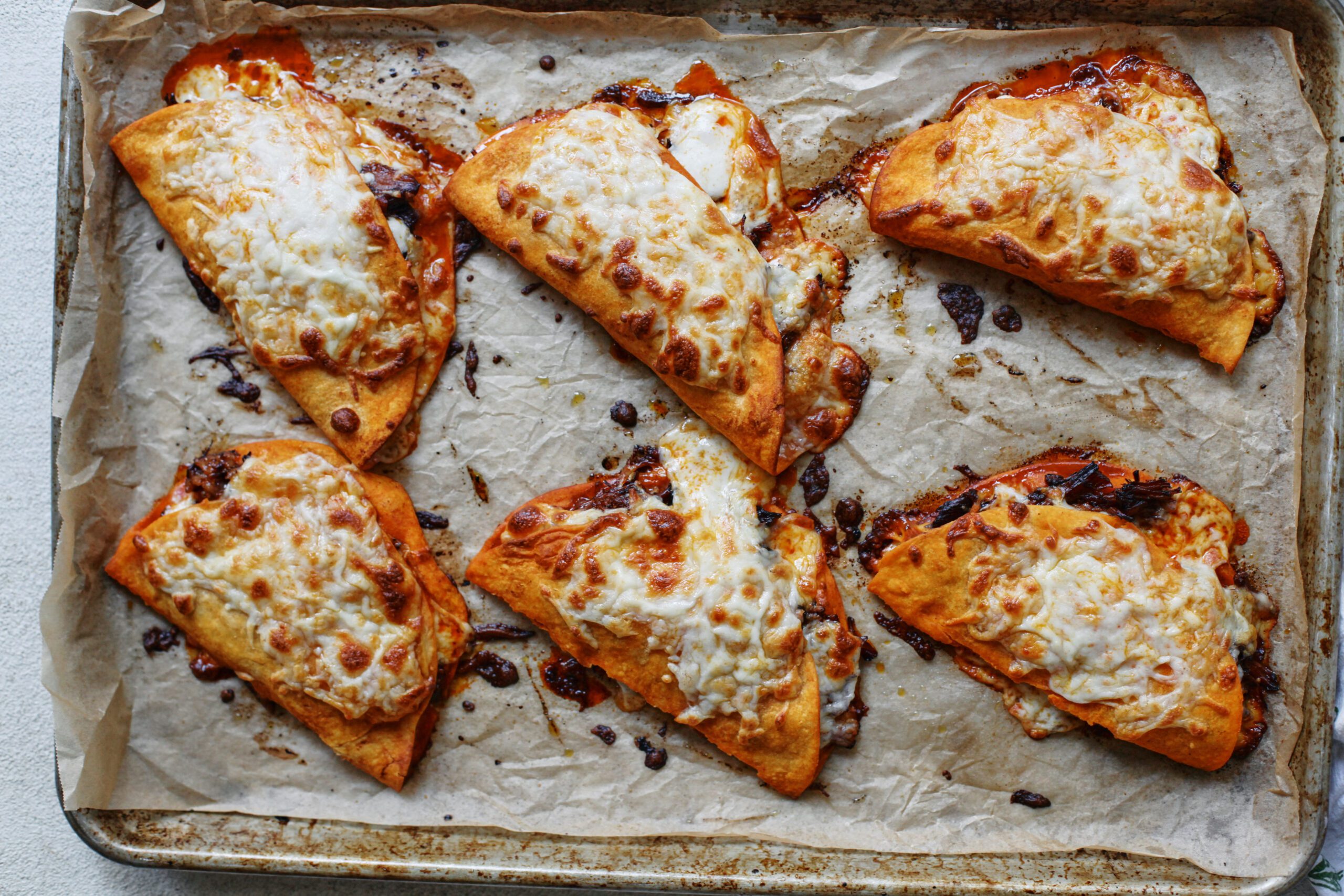 birria sheet pan tacos after being baked in the oven